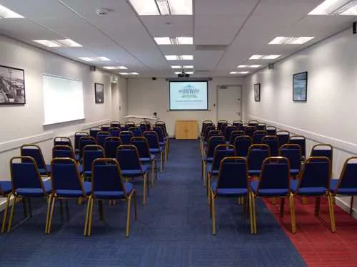 Alpha Charlie Suite 1 room hire layout at Runway Visitors Park – Concorde Conference Centre
