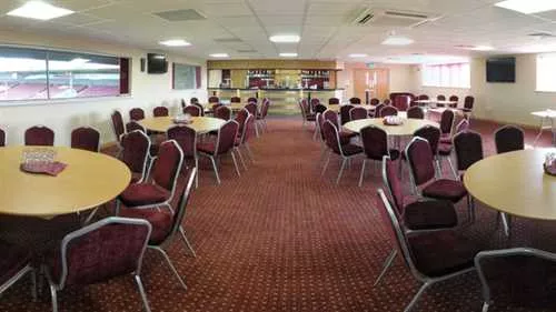 Executive Lounge 1 room hire layout at Scunthorpe United Football Club - Glanford Park