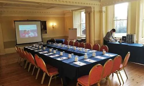 The Dawson Room 1 room hire layout at Holne Park House