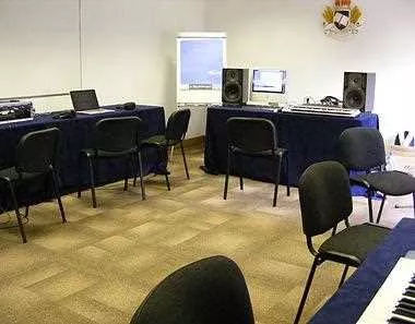 The Teaching Room 1 room hire layout at Nettle Hill Ltd