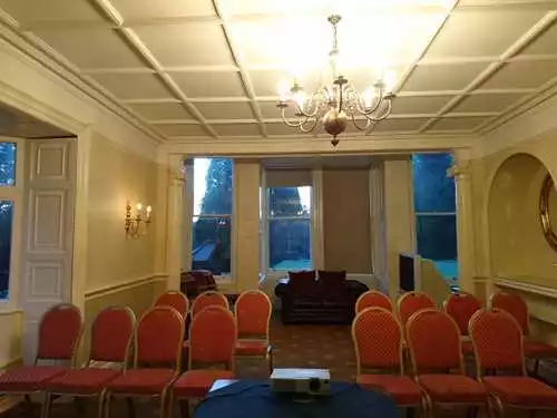 The Music Room 1 room hire layout at Holne Park House